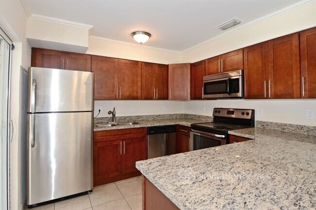 Building Photo - 6952 Tradewind Way