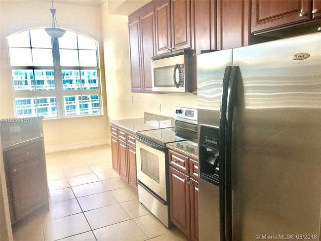 Building Photo - ALAQUA CONDO