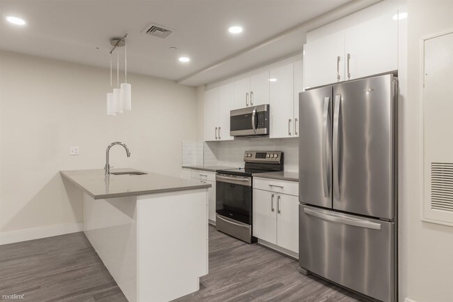 Foto del edificio - 5 br, 3 bath  - 1065 Tremont St # 107