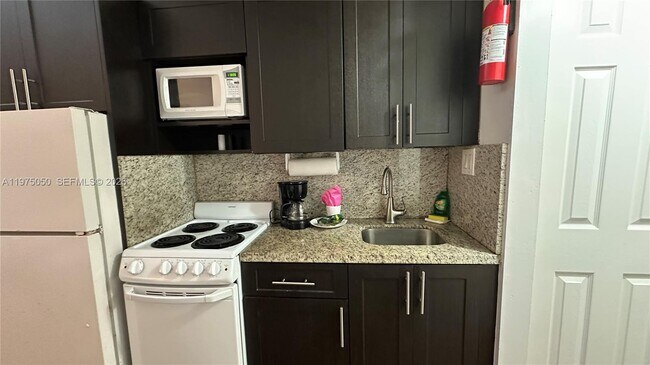 Building Photo - 19201 Collins Ave