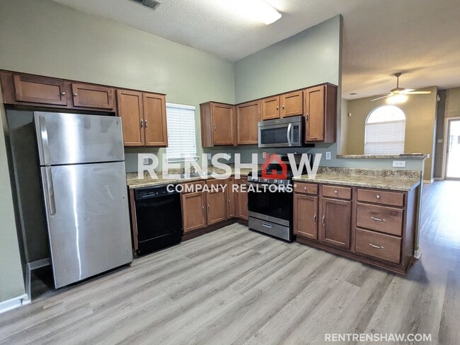 Building Photo - 6817 Kamali Ave.  - Lovely Home on Corner ...