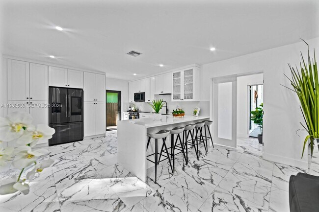 Building Photo - Northeast 137th Terrace, North Miami, FL 33181 - 4 BR 2 BA single-family home