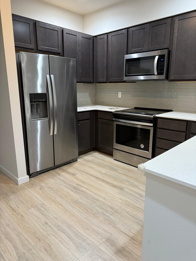 Kitchen with appliances - 13117 3rd Ave SE