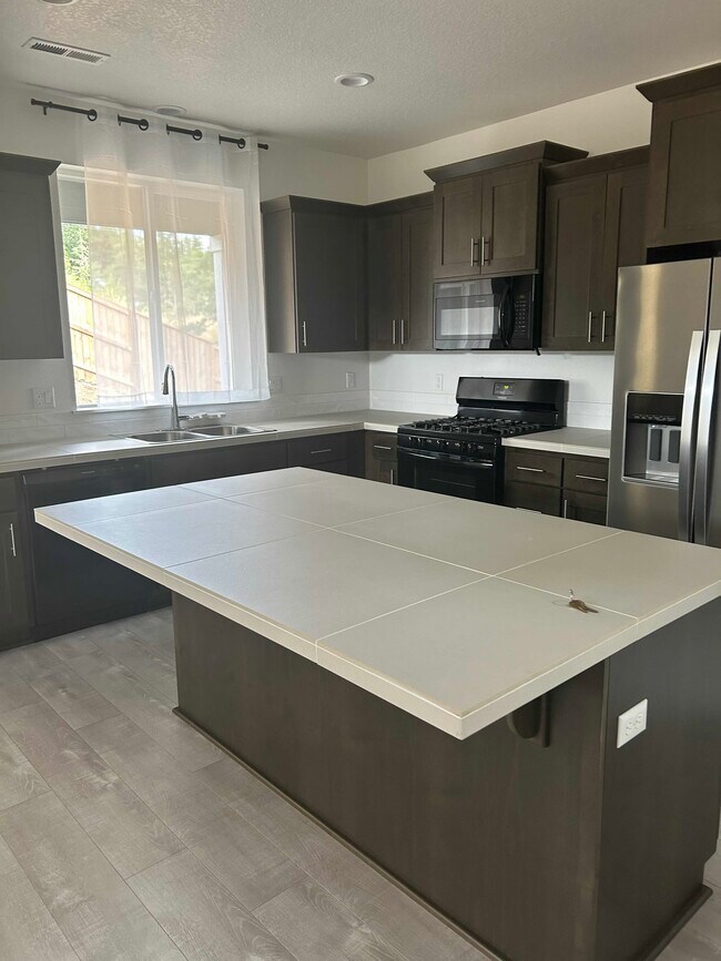 Foto del edificio - 5059 NW Stardown Dr