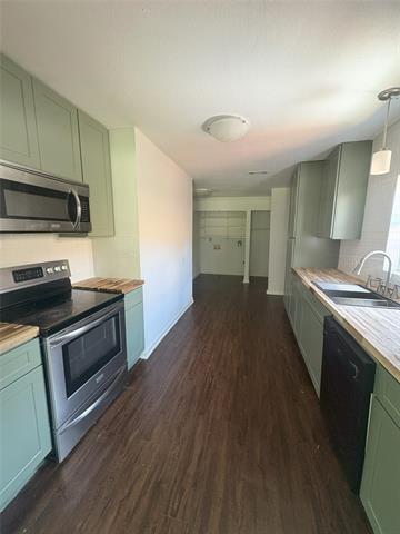Foto del edificio - 1227 S Oak Cliff Blvd