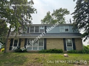 Building Photo - 1802 Manhattan Dr