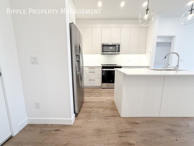 Building Photo - Modern 2 Beds, 2 Baths Apartment/Condo | Chestermere Living | 2 Pets Allowed. 20lbs Max