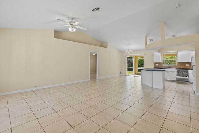 Building Photo - SPACIOUS FOUR BEDROOM!  Lehigh Acres