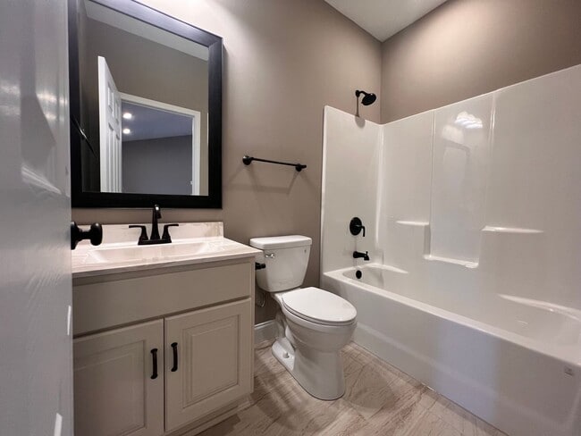 Building Photo - New condo 2 bedroom, 2 bath, 2 car garage