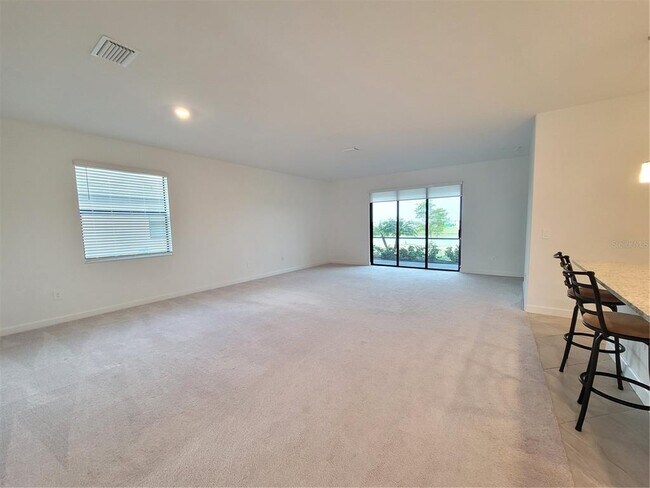 Foto del edificio - 15719 Islandwalk Ave