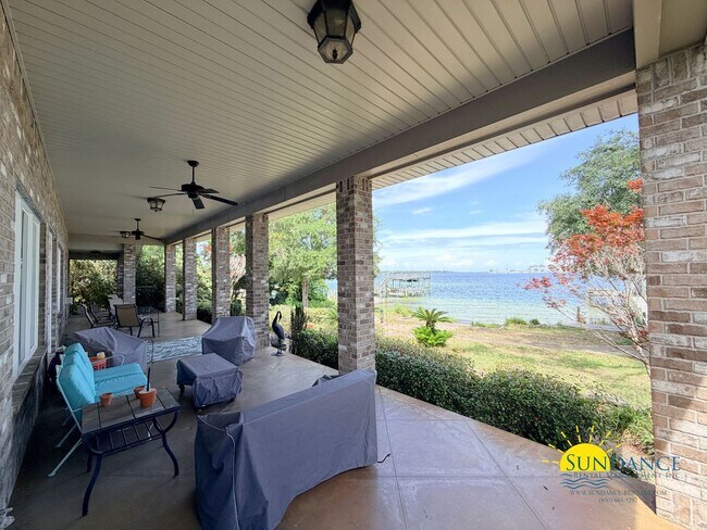 Building Photo - Beautiful Waterfront Property Near The Pallet Bar, Convenience Stores & Goofy Golf!