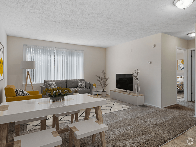 Living Room with Large Window - Lakecrest Apartments