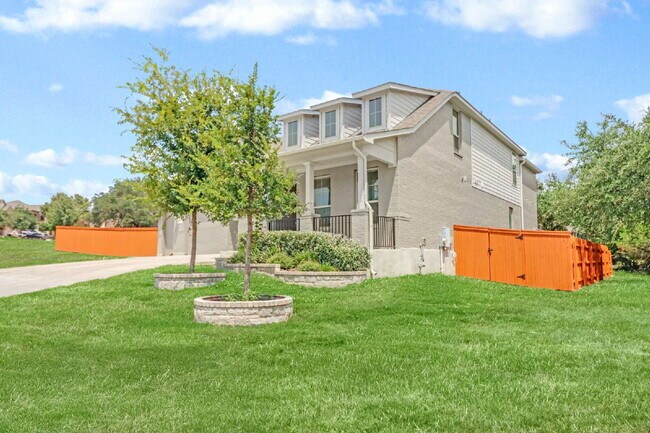 Building Photo - "Spacious 4-Bedroom Sanctuary with Cozy Fireplace in San Antonio's Prime Location!"