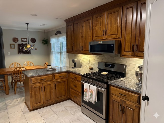 Updated kitchen with new appliances - 4019 Windswept Dr