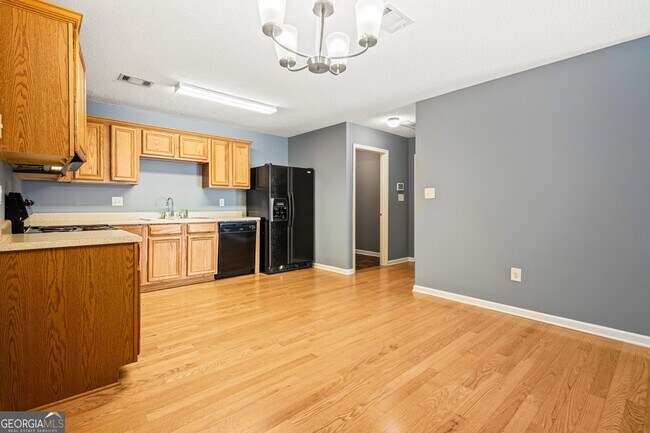 Building Photo - 5955 Raventree Ct