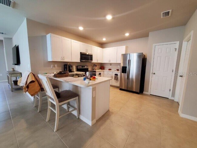 Building Photo - 7097 W Lenox Cir