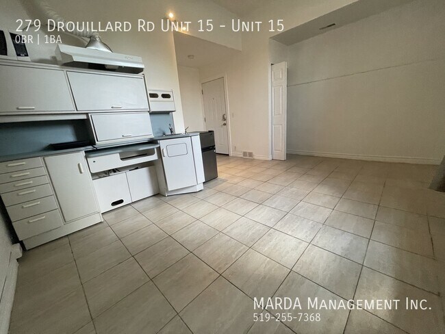 Building Photo - COZY BACHELOR UNIT - INCLUSIVE + FREE WIFI!!