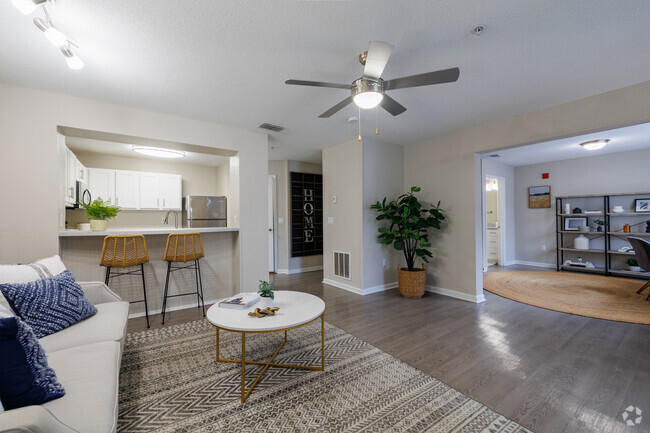 The Monroe - Model Living Room - The Monroe Apartment Homes