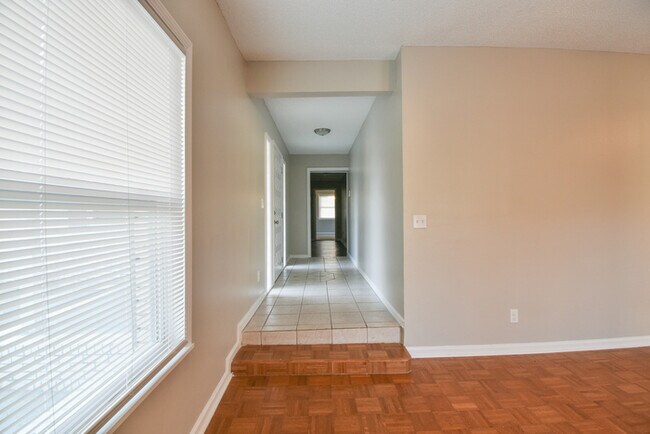 Building Photo - Lovely Four Bedroom w/ Tons of Yard Space