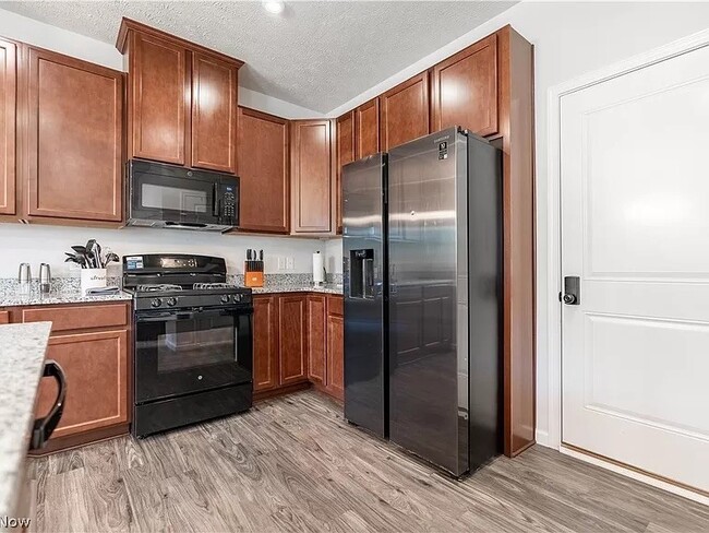 Refrigerator, stove, dishwasher and microwave included - 3383 Jackson Park Dr NW