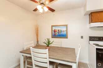 2BR, 1BA - 930 SF - Dining Room - Rock Creek Apartments