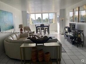 Building Photo - 5005 Collins Ave