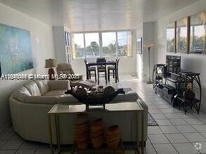 Building Photo - 5005 Collins Ave