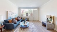 Located at 335 Melvin Ave in Hamilton, Ontario, this well-appointed one-bedroom, one-bathroom unit offers a comfortable and efficiently designed layout across a single floor. The living room is a welcoming space bathed in natural light from a large picture window, featuring crown moulding, light hardwood-style flooring, and a warm, neutral colour palette that creates a relaxed and inviting atmosphere.

The kitchen has been thoughtfully renovated with crisp white shaker-style cabinetry, white subway tile backsplash, light quartz countertops, and a full suite of stainless steel appliances including a fridge, stove, built-in microwave, and dishwasher. Recessed lighting and hardwood-style flooring complete the clean, modern aesthetic.

The bedroom is a comfortable and quiet retreat, featuring crown moulding, a window with natural views of surrounding greenery, and a closet with white panel doors. The bathroom is finished with classic white subway tile surrounding a full soaker tub and shower, paired with a grey vanity and a framed mirror, offering a clean and timeless design.

A private balcony extends the living space outdoors, providing views of the surrounding neighbourhood and green spaces. This unit combines practical updates with a comfortable living environment in a residential Hamilton community.
