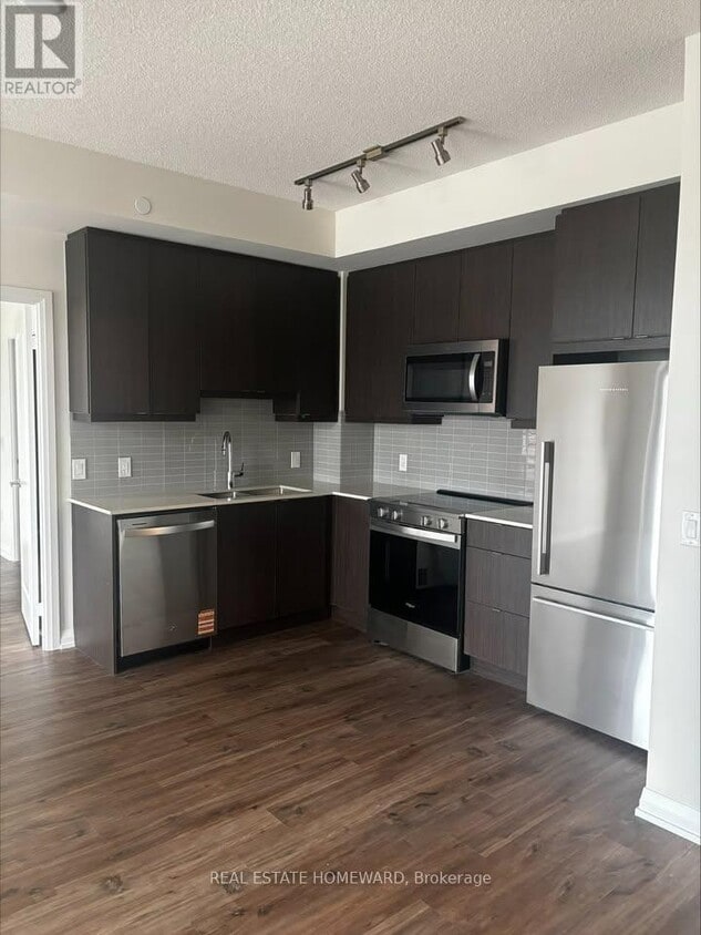 Photo principale - 3260 Sheppard Ave E