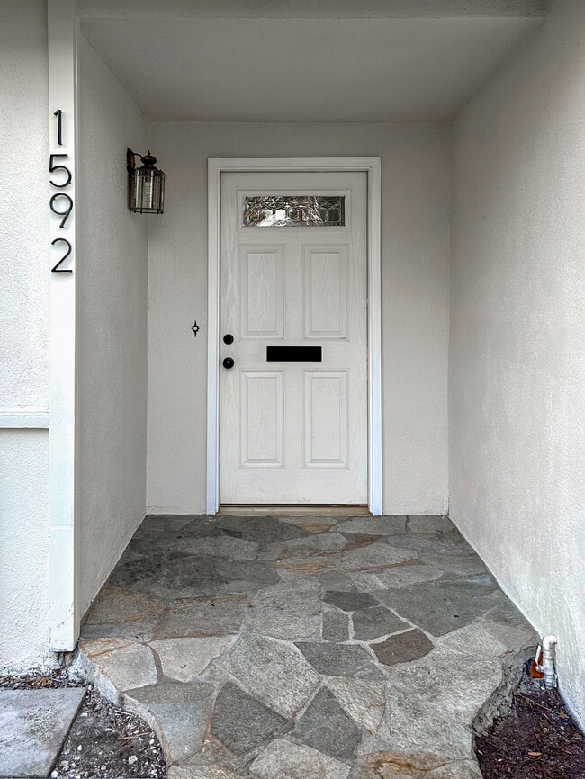 Front door with stone walkway - 1592 W Sim Pl