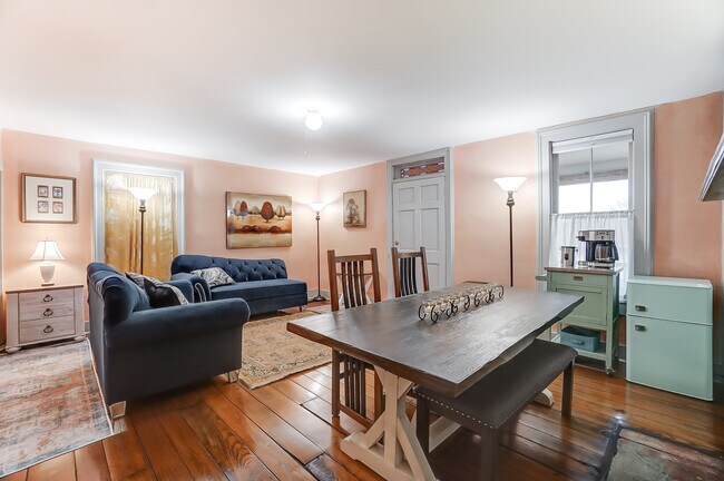 Living and dining in the main room - 705 Deacon St