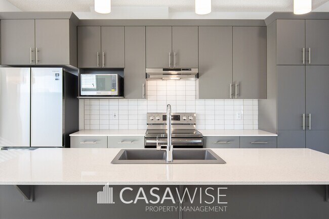 Photo du bâtiment - 1274 McConachie Blvd NW