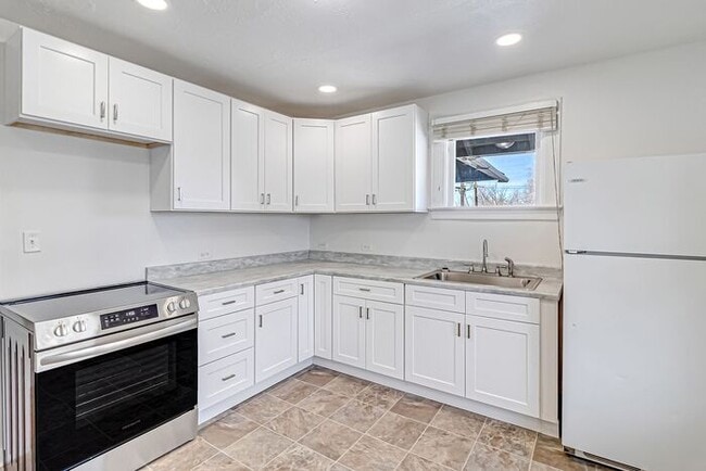 Photo - Renovated Upstairs 2-Bedroom, 2-Bath Apartment in Prime Downtown Location with 2 Office Spaces!