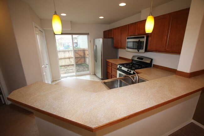Foto del edificio - 3 Bedroom East Anchorage Condo w/ Fenced Yard!