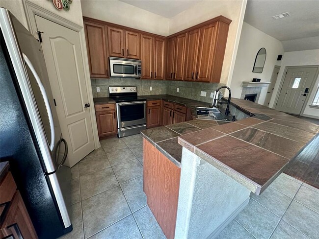 Foto del edificio - 15105 Cavalier Canyon Dr