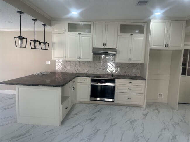 Foto del edificio - 6214 Ogden Forest Dr