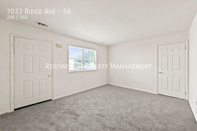 Building Photo - 7033 Ridge Ave