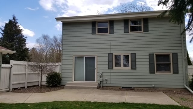 Fenced in back yard with concrete patio - 134 Chestnut Ridge Dr