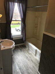 Bathroom w/ updated floor - 213 S Central Ave