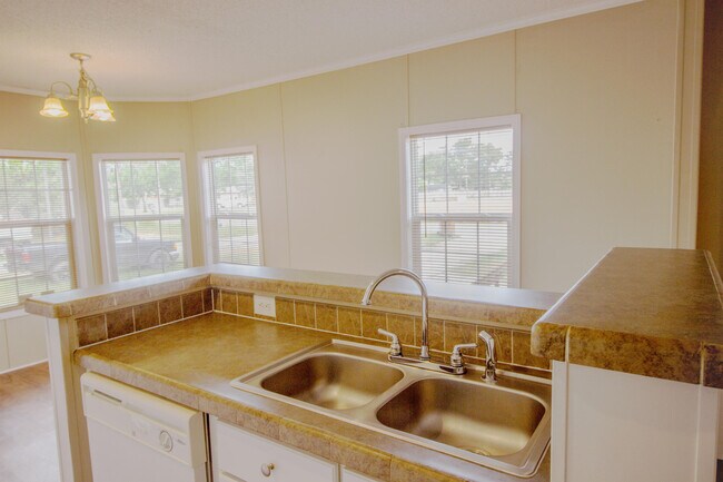 Building Photo - 9289 E River Dr