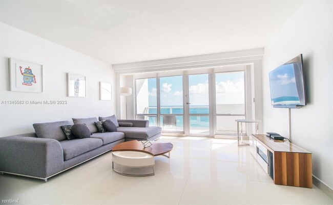 Building Photo - 2 br, 2.5 bath House - 5601 Collins Ave Ap...