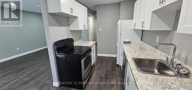 Photo du bâtiment - 1005 Lanark Pl