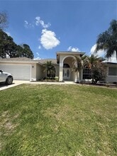 Building Photo - 5711 NW Zenith Dr
