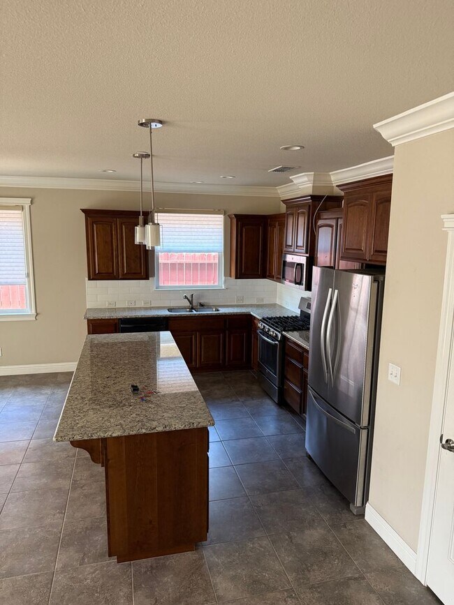 Foto del edificio - 3-bedroom, 2-bathroom home located in the ...