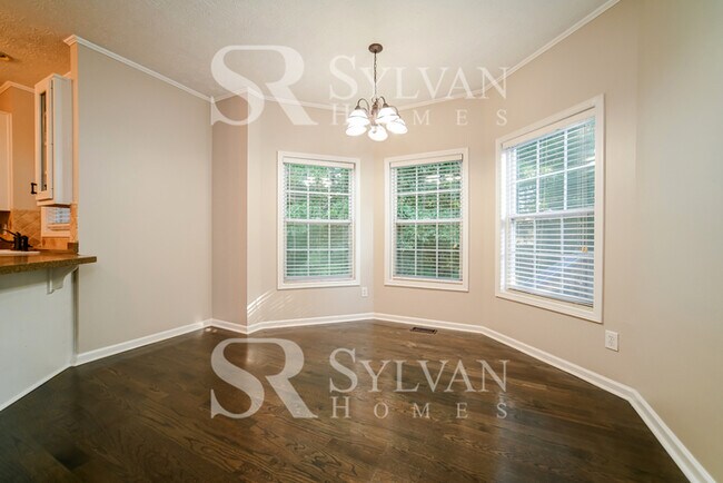 Building Photo - Welcome to this charming abode.