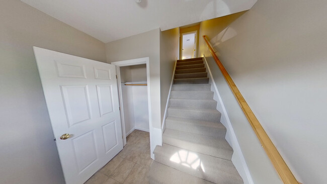 Entry-way & Staircase up to unit - 47 Courtland St