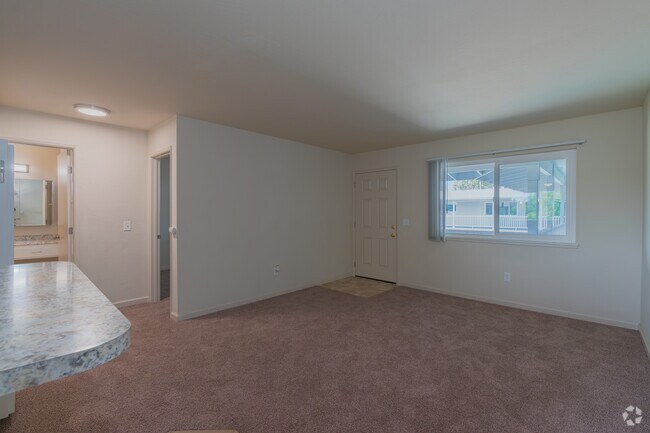 1BR, 1BA - 600SF - Living Room - Sunrise Apartments
