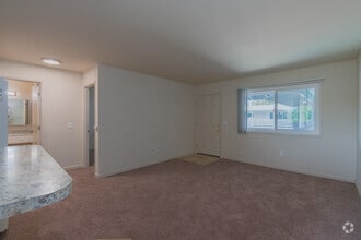 1BR, 1BA - 600SF - Living Room - Sunrise Apartments