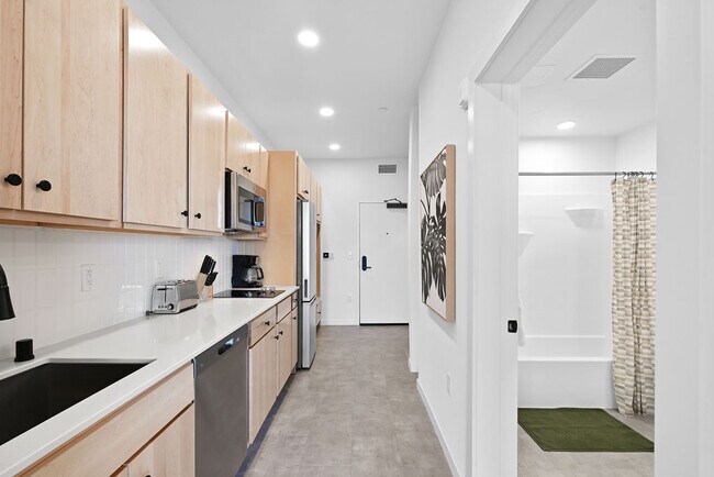 Building Photo - The Common Place Apartments