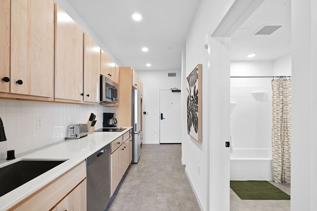Building Photo - The Common Place Apartments